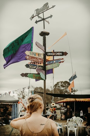 Woman Standing Near Post