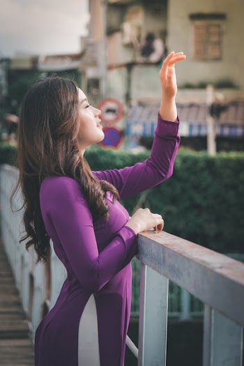 Woman Standing Near Railings