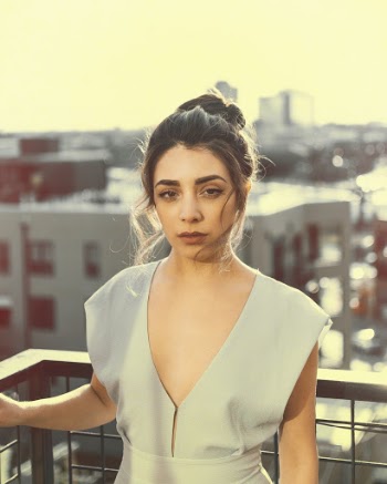Woman Standing Near Railings