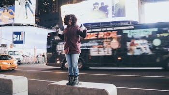 Woman Standing Near Road
