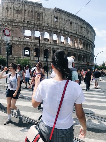 Woman Standing Near Rome Coliseum