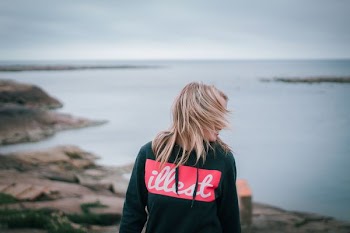 woman standing near sea