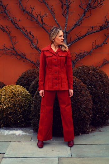 Woman Standing Near Topiary