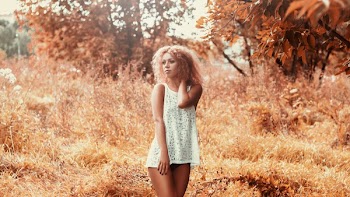 Woman Standing Near Tree