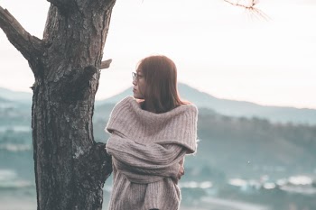 Woman Standing Near Tree