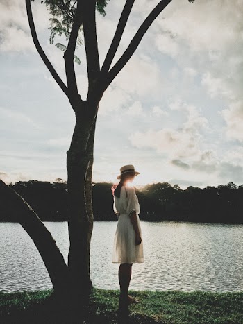 Woman Standing Near Tree