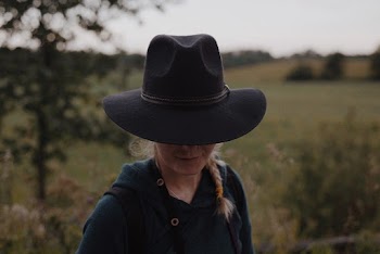 Woman Standing Near Tree and Grass