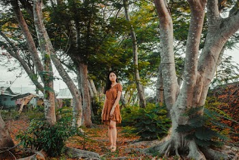 Woman Standing Near Trees