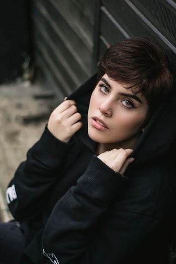 woman standing near wall