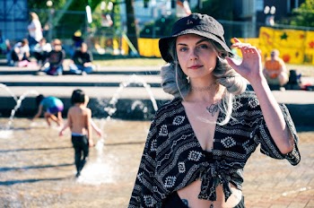 Woman Standing Near Water Fountain