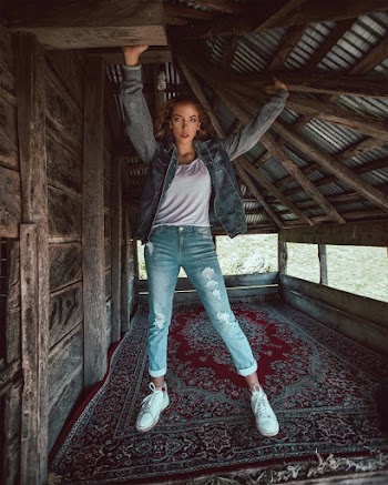 Woman Standing On Area Rug 