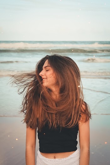 Woman Standing on Beach