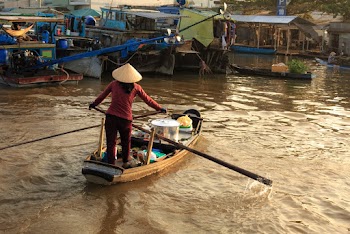 Woman Standing on Boat