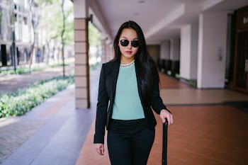 Woman Standing on Brown Floor