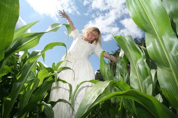 Woman Standing on Crop Field