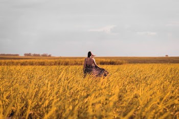 Woman Standing on Field