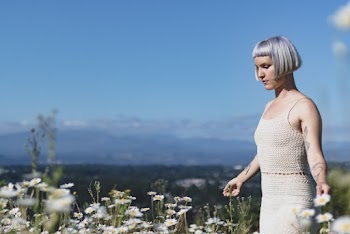 Woman Standing on Flower Field