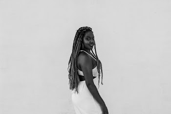 Woman Standing on Grayscale Photography