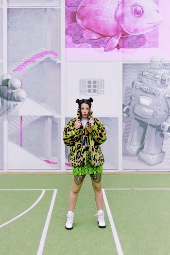 Woman Standing on Green Painted Court