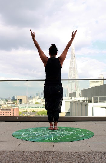 Woman Standing on Mat