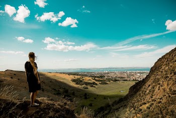 Woman Standing on Mountain Overlooking Plainfield