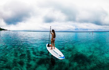 Woman Standing on Paddleboard