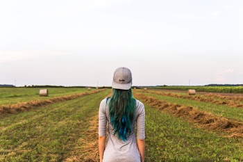 Woman Standing on Pasture