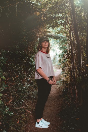 Woman Standing On Pathway