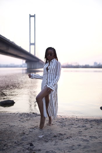 Woman Standing on river banks