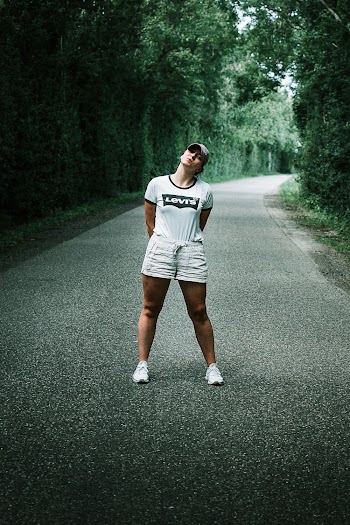 Woman Standing on Road