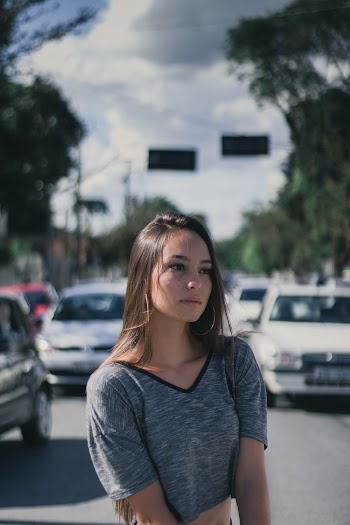 Woman Standing on Road