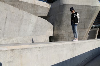 Woman Standing on Road Concrete Hallway
