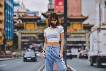 Woman Standing on Road Island during Day