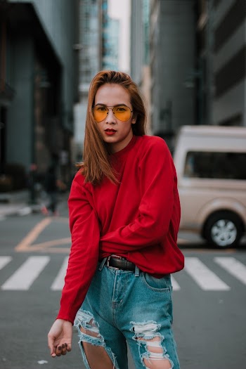 Woman Standing on Road Near Pedestrian Lane