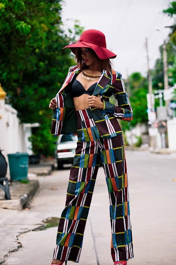 Woman Standing on Road Wearing Multicolored Blaze and Sun Hat