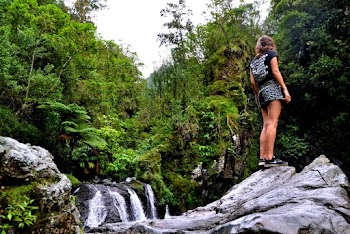 Woman Standing on Rock