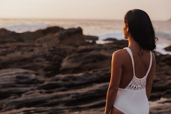 Woman Standing on Rocks