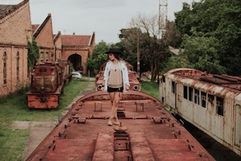 Woman Standing on Roof of Train