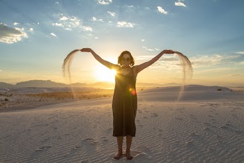 Woman Standing on Sand