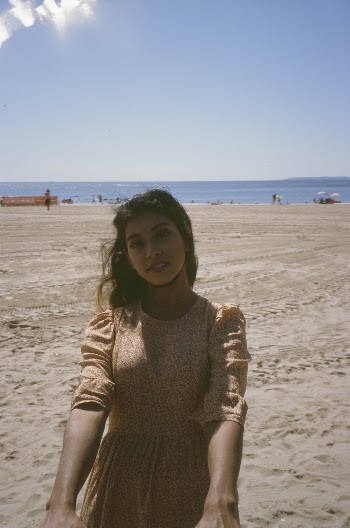 Woman Standing on Seashore