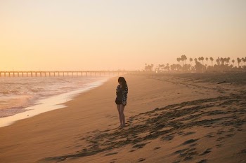 woman standing on seashore