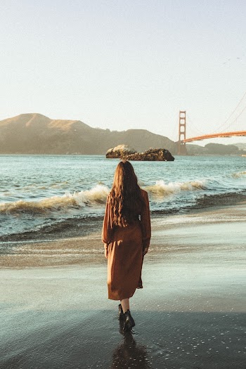 Woman Standing on Shore