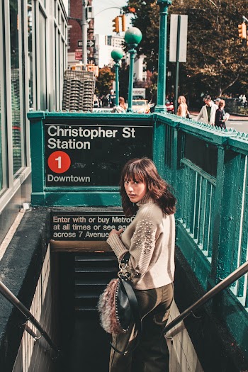 Woman Standing on Stairs