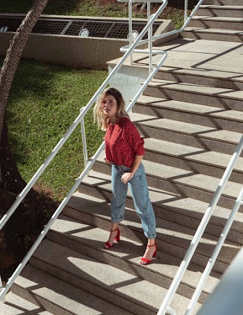 Woman Standing on Stairs