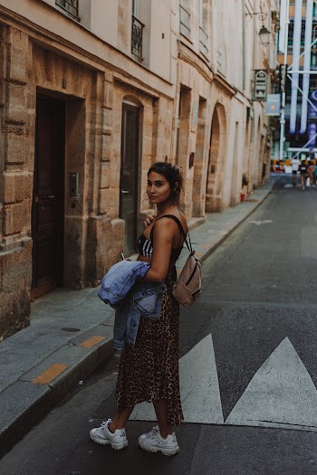 Woman Standing on Street Looking Back