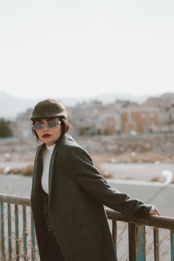 Woman Standing on the Bridge  · Free Stock Photo