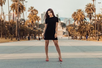Woman Standing On The Center Of The Road