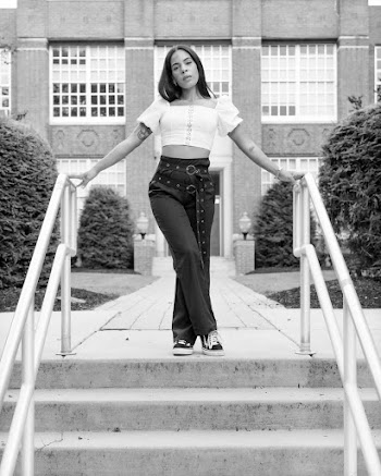 Woman Standing On Top Of  The Stair