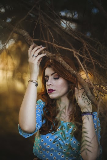 Woman Standing Under Tree