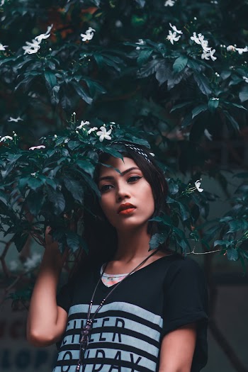 Woman Standing Under Trees
